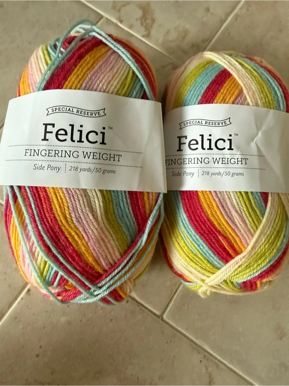 Felici Fingering Weight Yarn - Multicolor Pastel Stripes 2 Skeins Side Pony